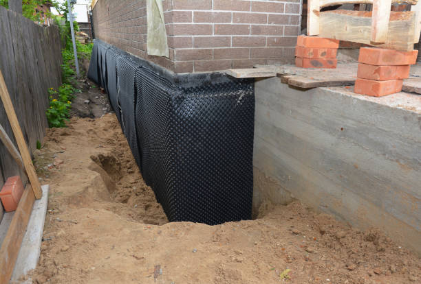 Happy homeowners after waterproofing job in Athens
